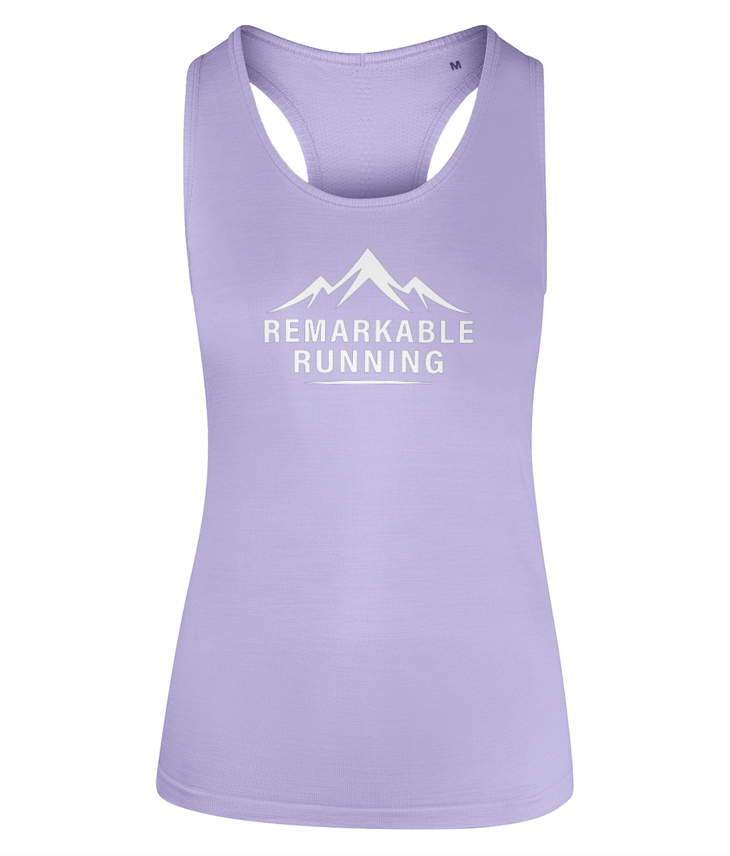Woman's Purple multi-sport flex vest with 'Remarkable Running' logo