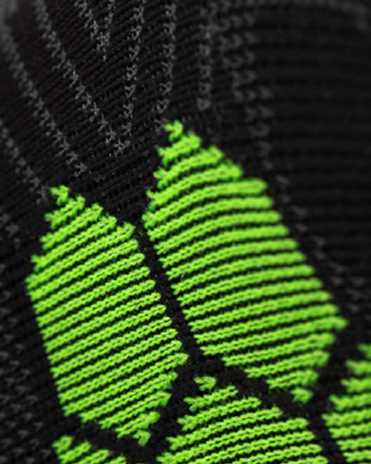Close-up of a green logo on a black background