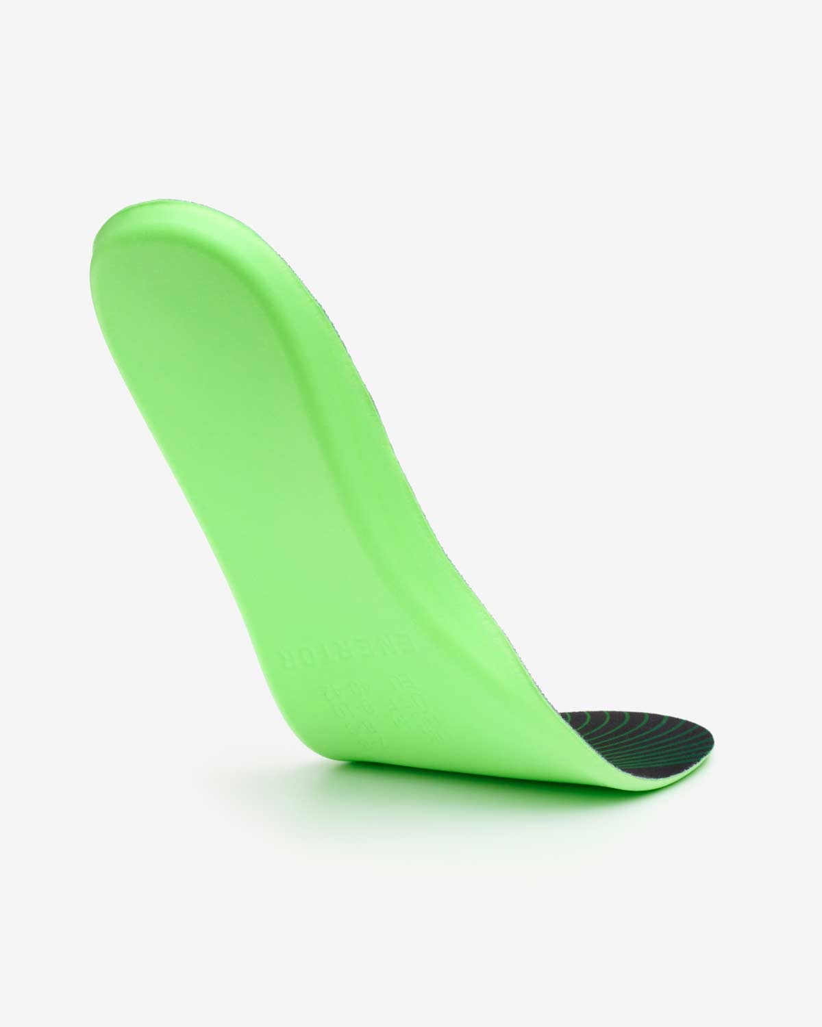 Green shoe insole on a white background