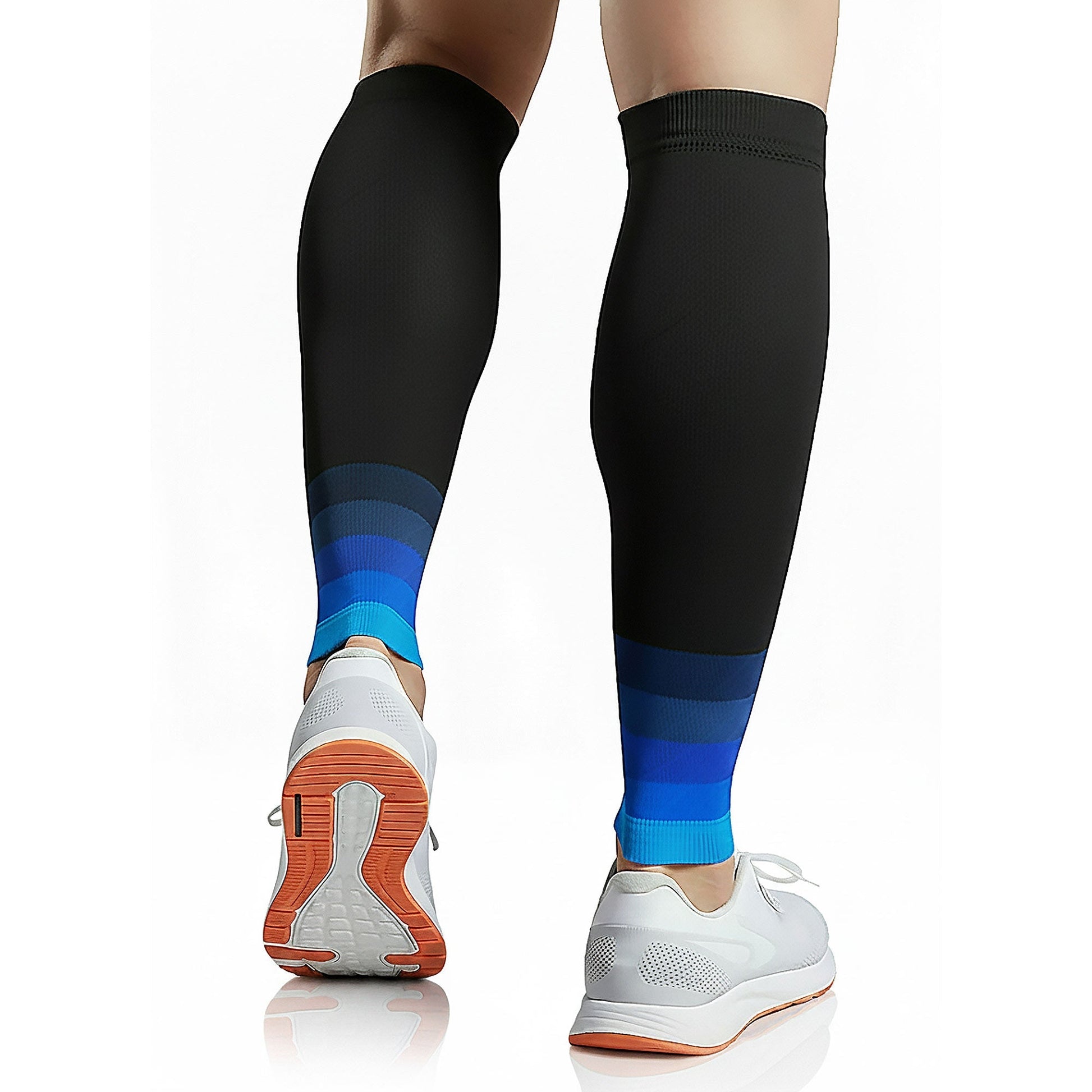 Black and blue gradient compression sleeves on legs with white sneakers.
